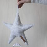 caixa de musica em forma de estrela pure grey da little dutch